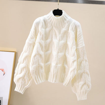 Pull en tricot confortable pour femmes avec des manches volumineuses et un motif torsadé Chic und Stil