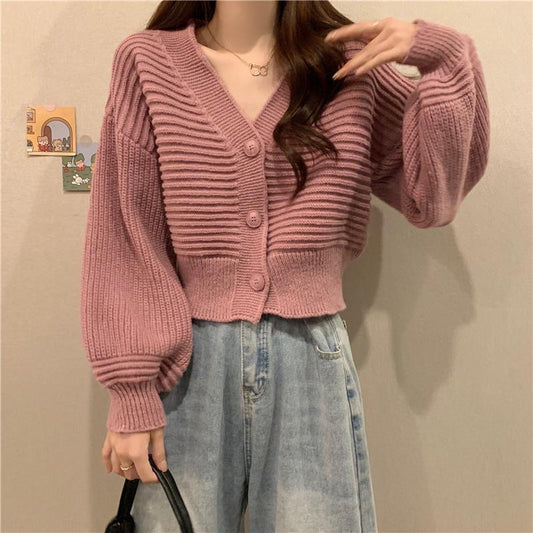 Cardigan en tricot confortable et élégant pour femmes avec des manches volumineuses et des détails de boutons Chic und Stil