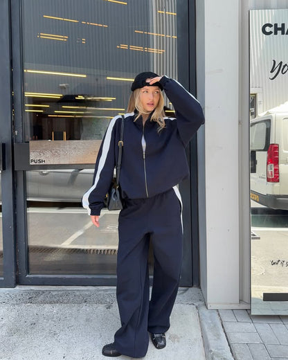 Women's sporty outfit with trendy zipper and wide pants Chic and Style