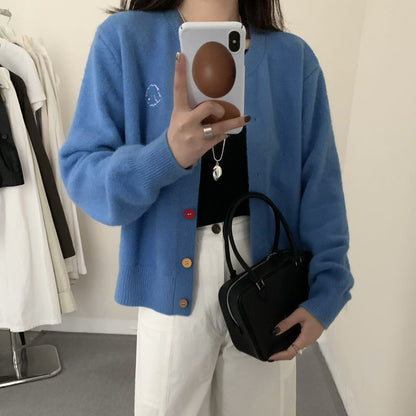 Dames pull-over en tricot douillet avec décolleté boutonné et motif brodé Chic und Stil