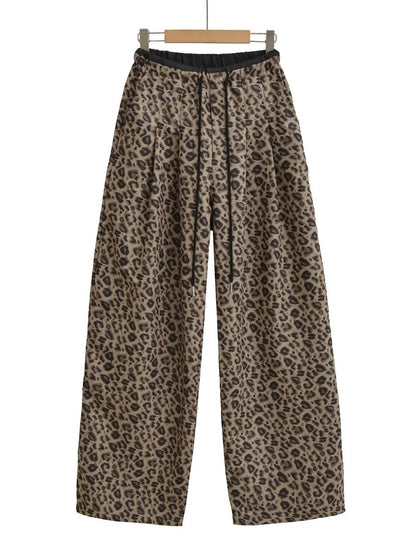Trendy leopard wide-leg pants for women with elastic waistband and tie belt Chic and Style