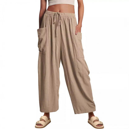 Casual harem pants for women with practical side pockets and loose fit Chic and Style