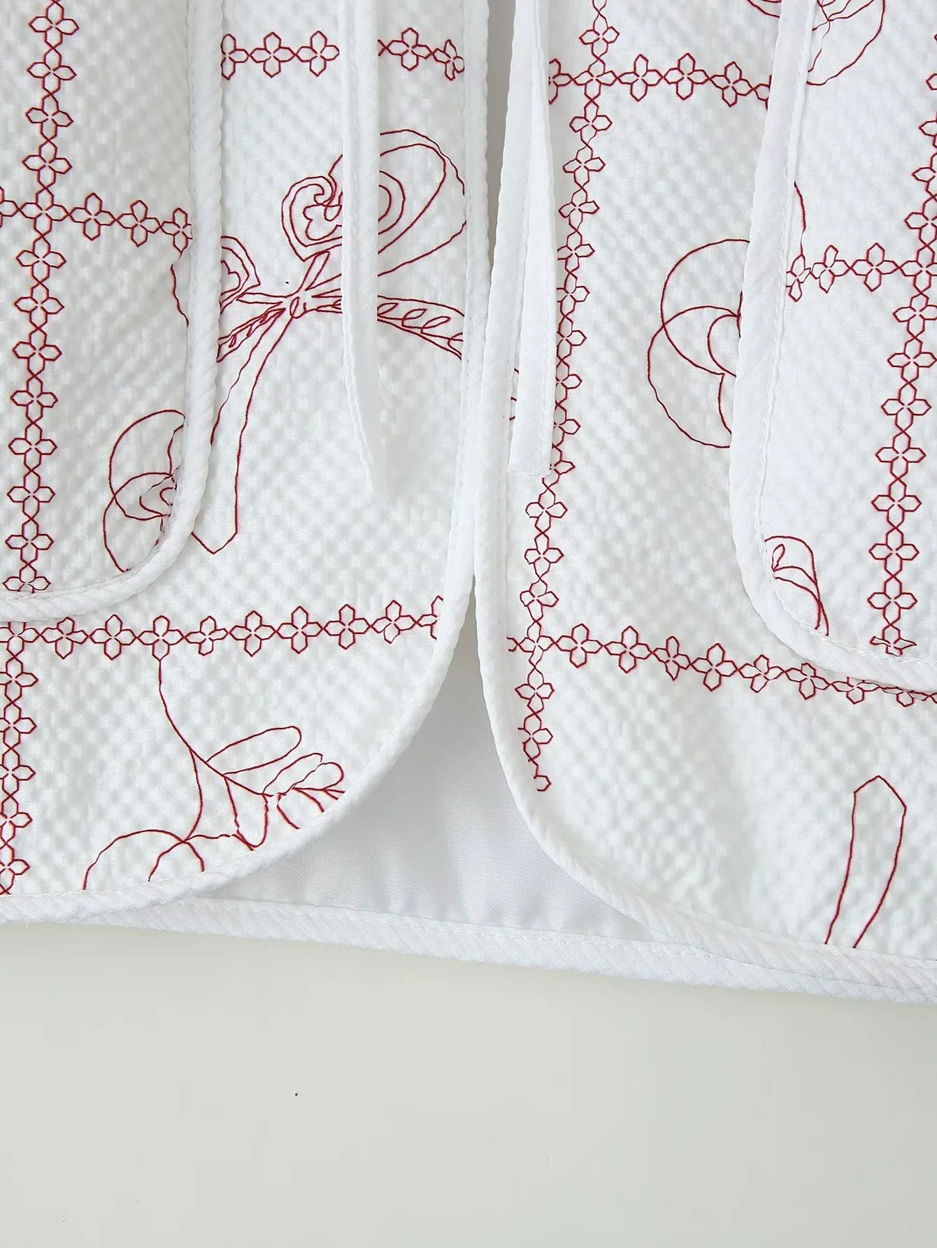 Dame veste avec motif floral et poches pratiques Chic und Stil