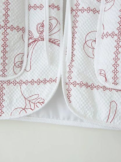 Dame veste avec motif floral et poches pratiques Chic und Stil