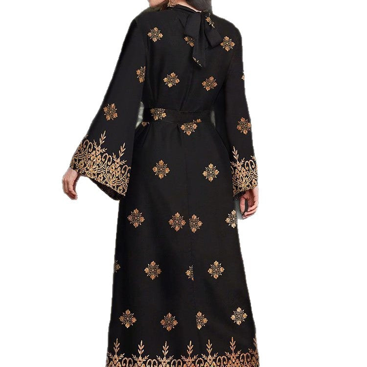 Robe de soirée festive pour femmes avec un élégant motif doré et floral Chic und Stil