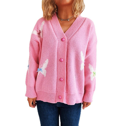 Dame cardigan avec un design de papillon ludique et fermeture à bouton Chic und Stil
