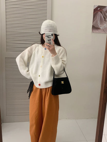 Dames Pull-over douillet avec des boutons colorés et coupe décontractée Chic und Stil