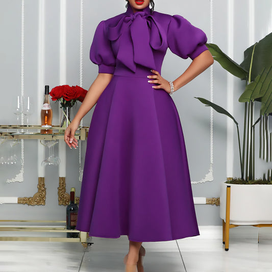 Robe maxi élégante pour femme avec des manches bouffantes volumineuses et un col à nœud Chic und Stil