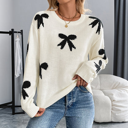 Dames Pull doux avec un motif nœud ludique Chic und Stil
