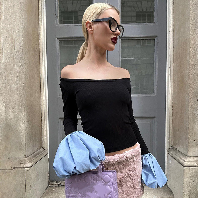 Dames Élégant haut avec une large zone d'épaule et de longues manches bouffantes Chic und Stil