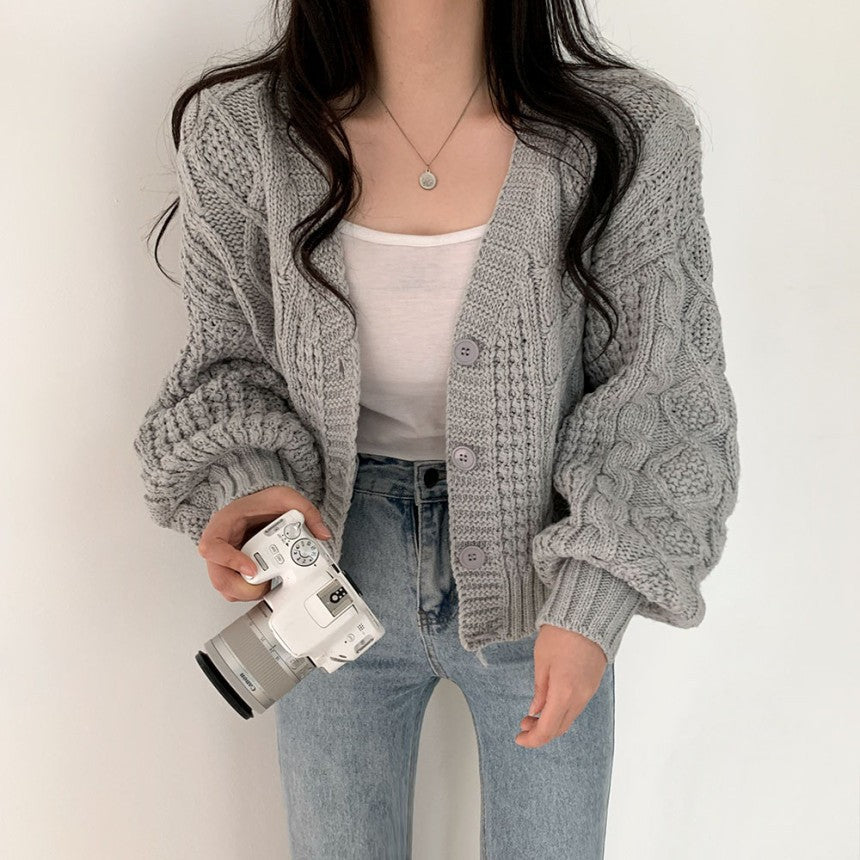 Cardigan femme en grosse maille avec motif en relief et détails de boutons Chic und Stil