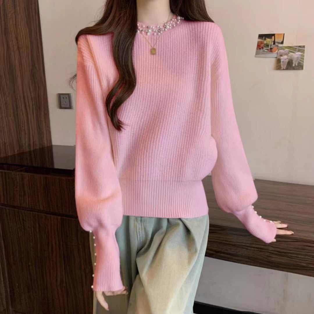Dames pull élégant avec des détails ornés de perles Chic und Stil