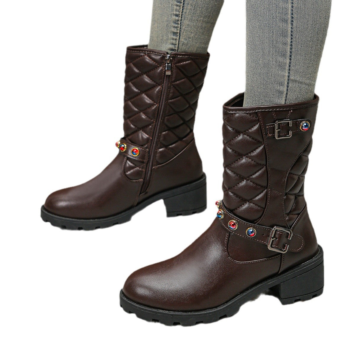 Bottes mode pour dames avec des détails décoratifs en bijou et un profil robuste Chic und Stil