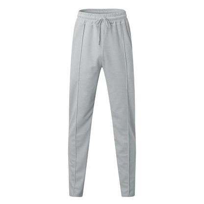 Pantalon de jogging sportif pour hommes avec taille élastique et poches zippées Chic und Stil