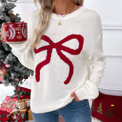 Dames pull confortable avec motif de nœud festif Chic und Stil