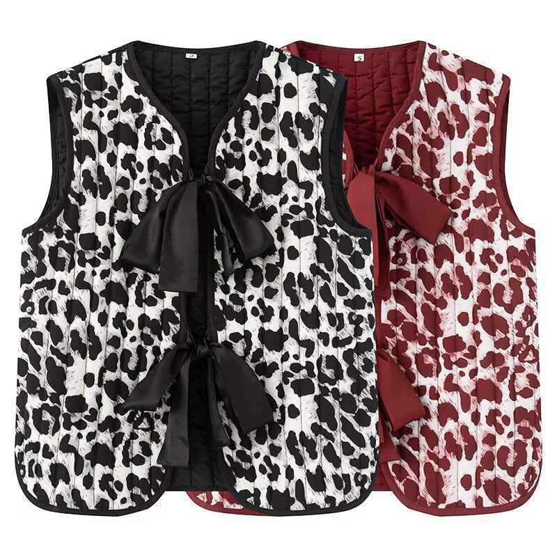 Dames gilet matelassé avec motif animal à la mode et nœud décoratif Chic und Stil