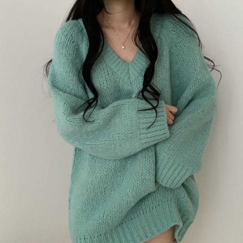 Pull-over décontracté oversized pour femmes avec décolleté en V profond et matière en tricot douce Chic und Stil