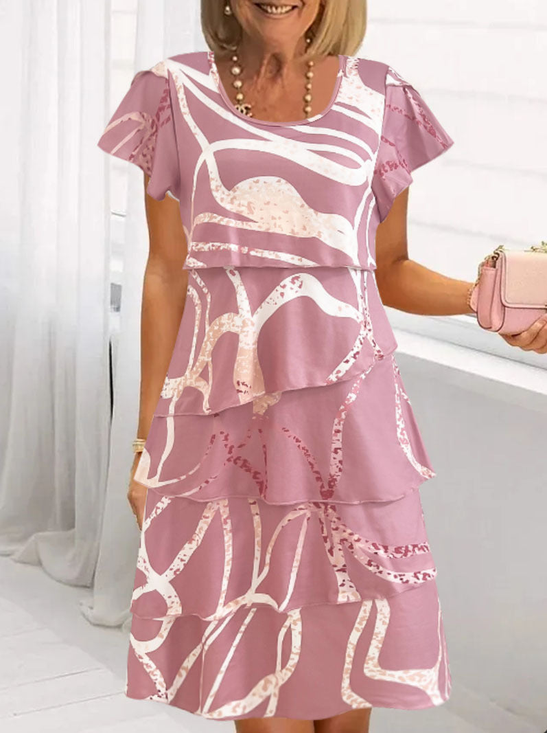 Robe portefeuille fluide pour femmes avec un superposition élégante et un motif unique Chic und Stil