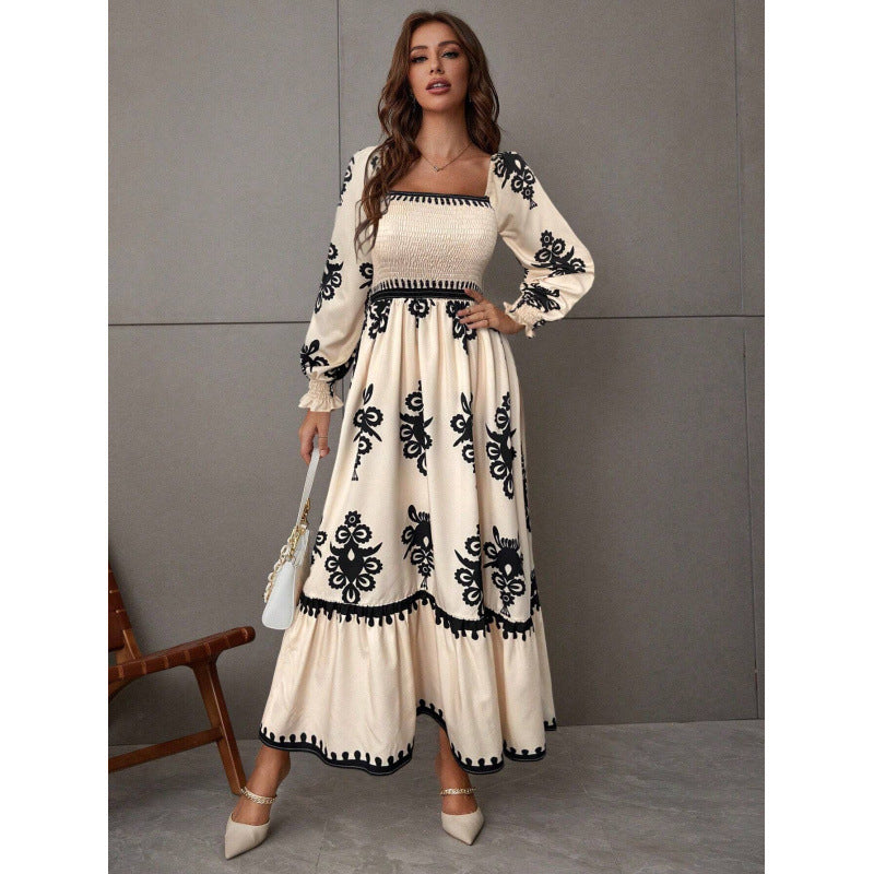 Femme Robe maxi élégante avec coupe à manches bouffantes et détails floraux Chic und Stil