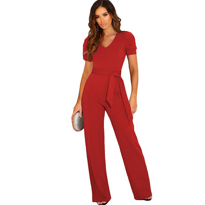 Elegant women's jumpsuit with waist belt and puff sleeves Chic and Style