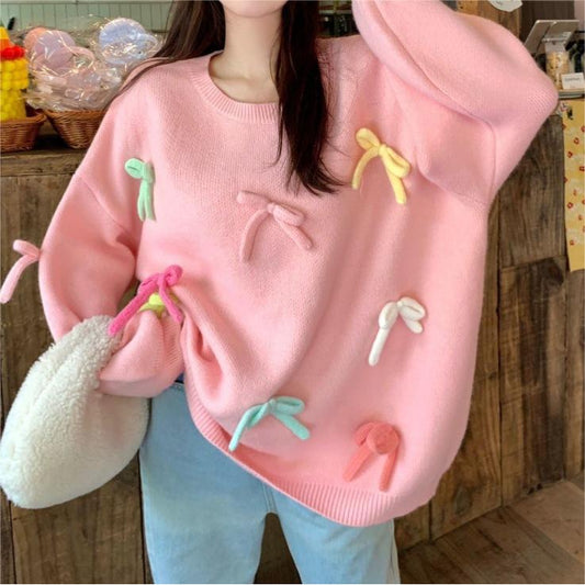 Pull décontracté pour femmes avec des appliqués de nœuds ludiques Chic und Stil
