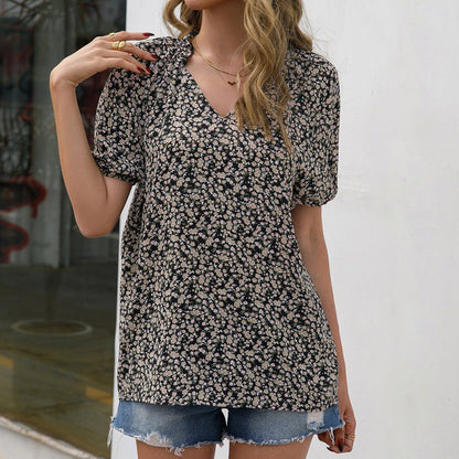Blouse pour dames avec des détails en volants et un motif floral Chic und Stil