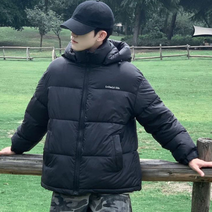 Dame Veste matelassée thermoisolante avec capuche ajustable et poches latérales Chic und Stil