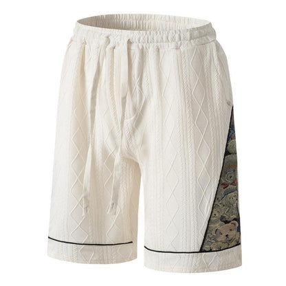 Men's athletic leisure pants with a creative floral design Chic and Style