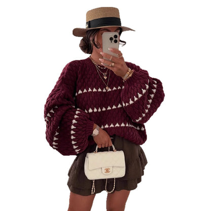 Pull féminin tendance avec une coupe ample et un design structuré Chic und Stil