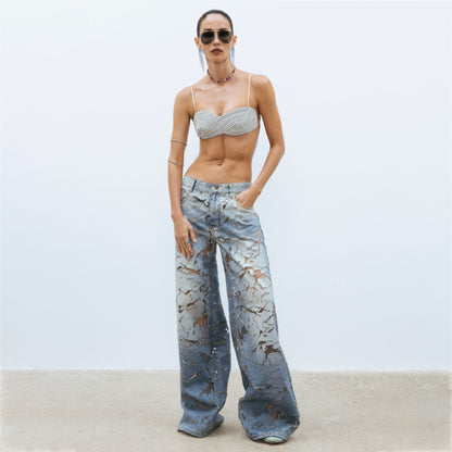 Ladies Flared denim pants with unique distressed details Chic und Stil