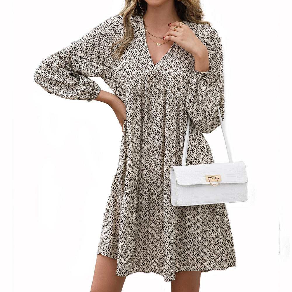 Robe midi pour femmes avec des manches bouffantes et un décolleté en V Chic und Stil
