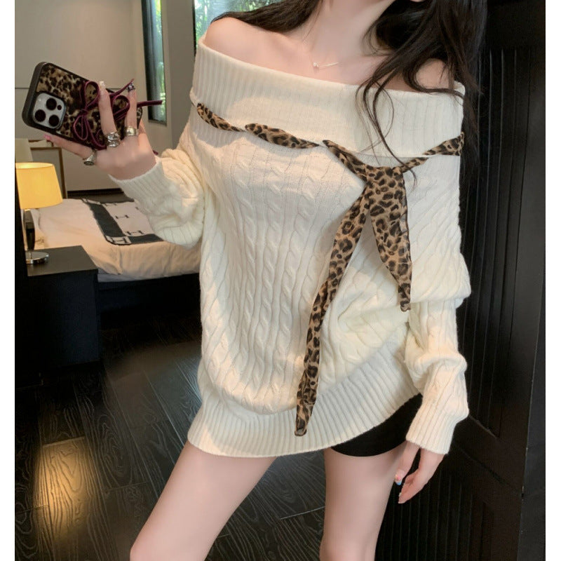 Pull en grosses mailles pour femmes avec épaule dénudée et accent de nœud ludique Chic und Stil