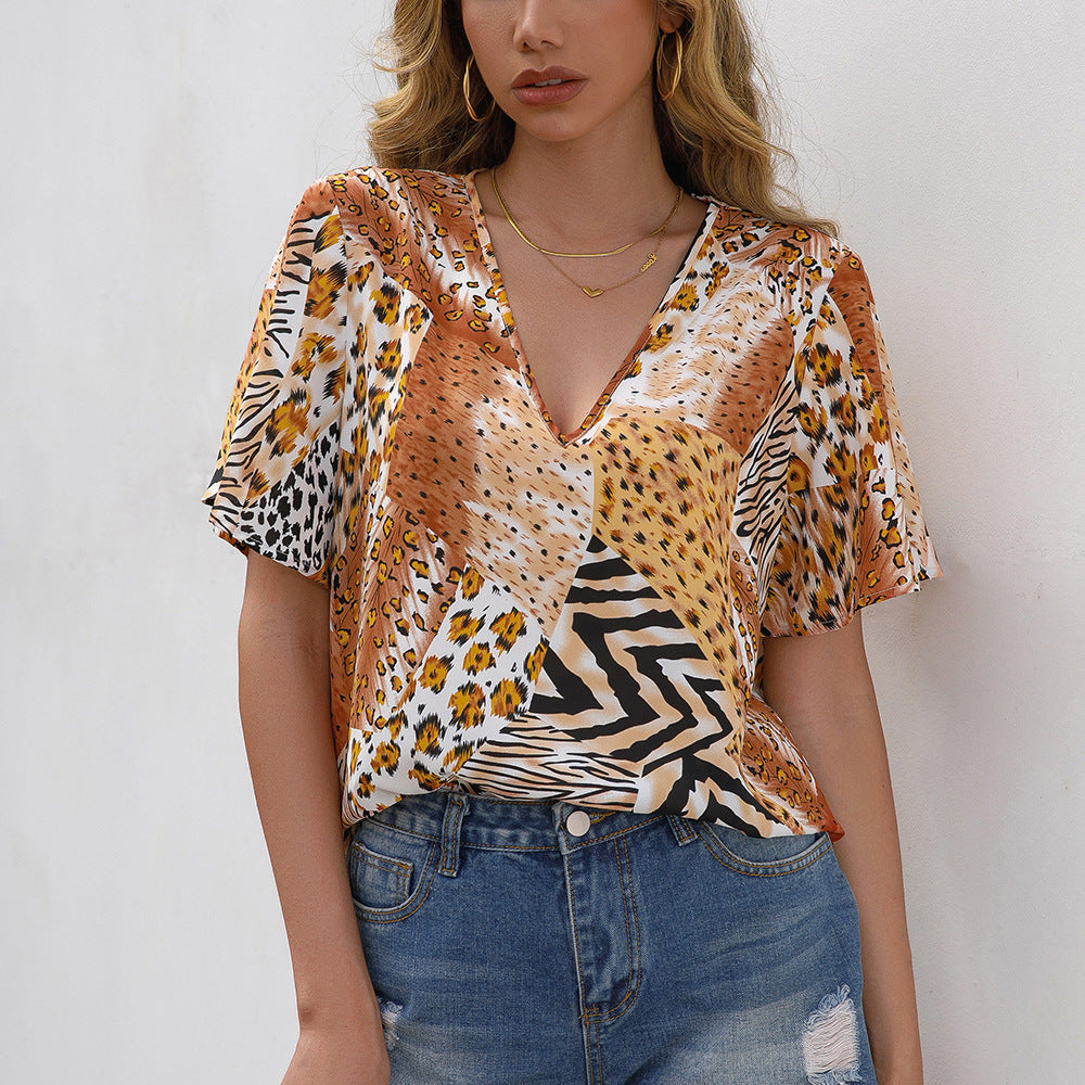 Blouse à motif animal pour femmes avec décolleté en V et manches amples Chic und Stil