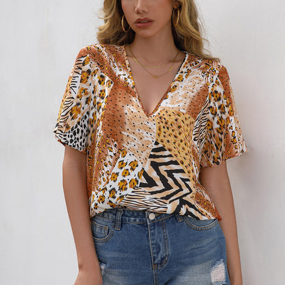 Blouse à motif animal pour femmes avec décolleté en V et manches amples Chic und Stil