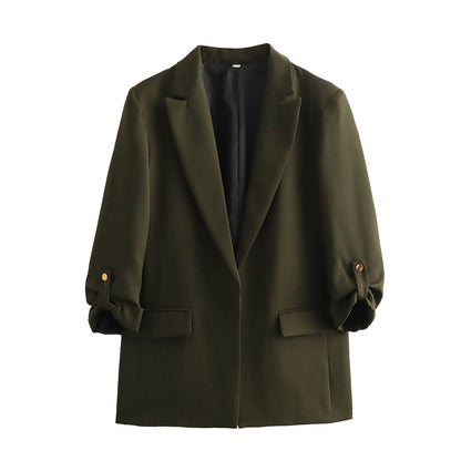 Elegant blazer jacket for women with structured sleeves and discreet golden accents Chic and Style