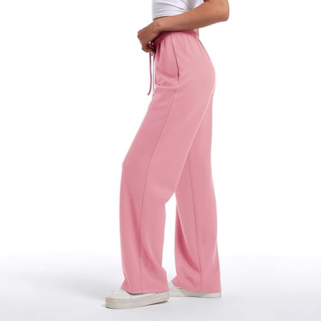 Loose sports pants for women with elastic waistband and side pockets Chic und Stil