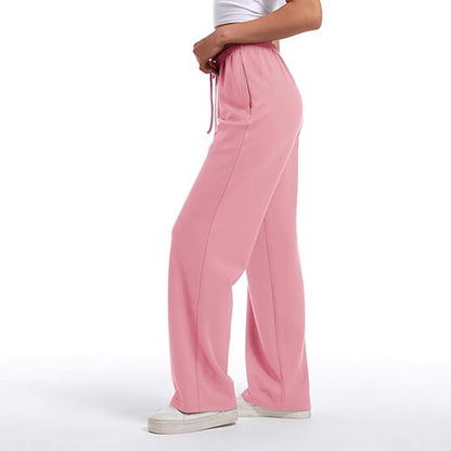 Loose sports pants for women with elastic waistband and side pockets Chic und Stil