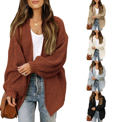 Dames Cardigan en gros tricot délicat avec des manches chatoyantes Chic und Stil