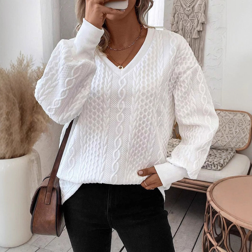 Pull en tricot pour femmes avec un profond décolleté en V et un motif texturé Chic und Stil
