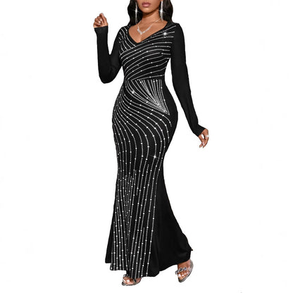 Robe de soirée scintillante à manches longues Chic und Stil