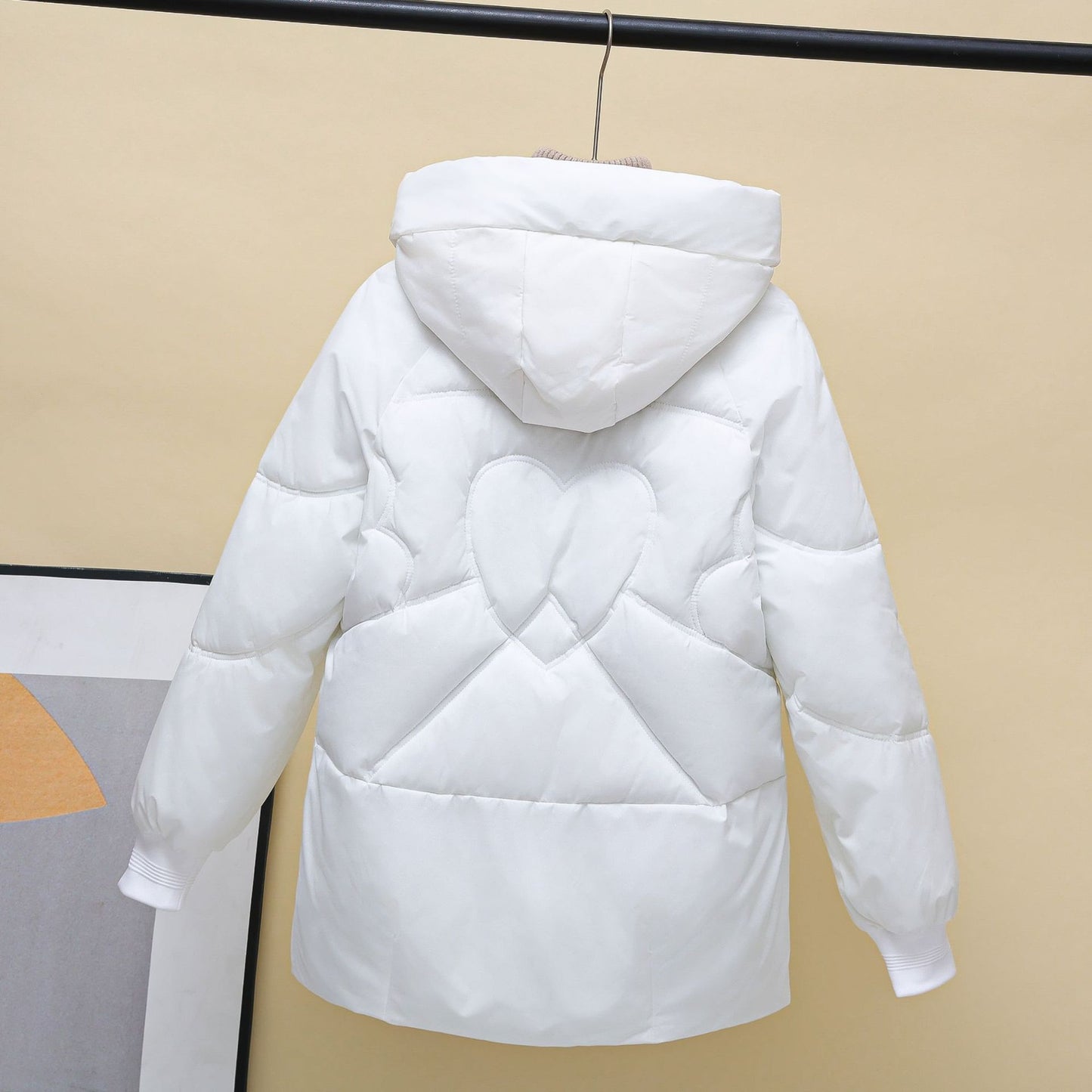 Dames doudoune d'hiver matelassée avec capuche et détails en forme de cœur Chic und Stil