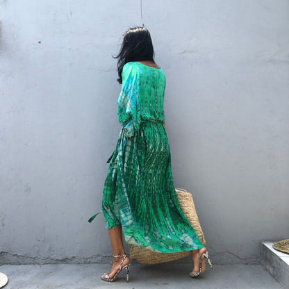 Robe maxi femme avec un motif batik stylé et des fentes latérales Chic und Stil