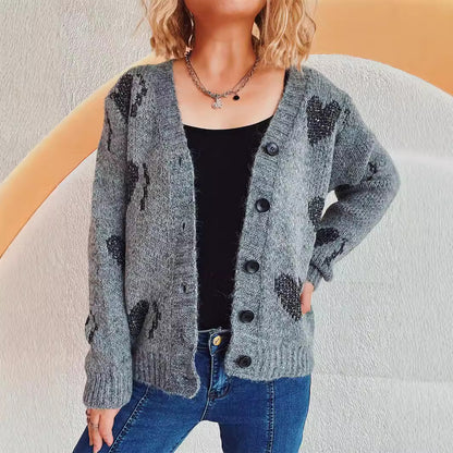 Cardigan en tricot pour femmes avec motif en forme de cœur et détails de boutons Chic und Stil