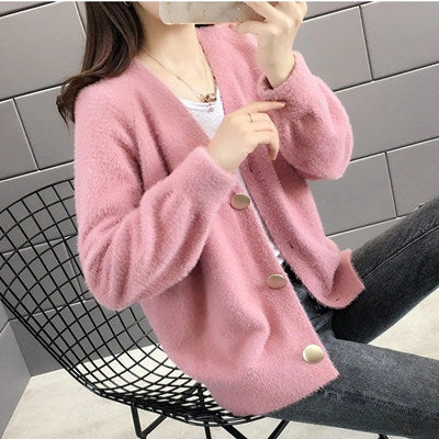 Ladies plush pullover with stylish button details Chic und Stil