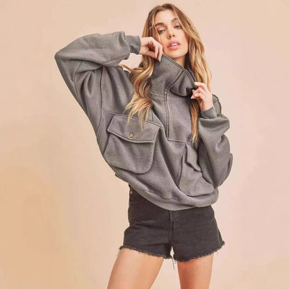 Dames Pull en fleece sportif avec zip et poche Chic und Stil