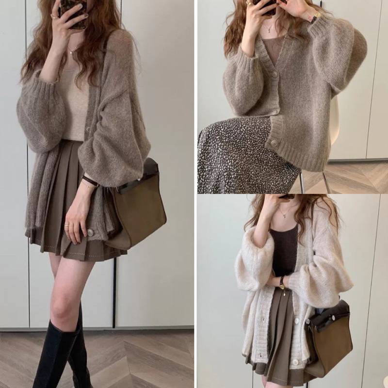 Ladies Cozy Knit Pullover with Voluminous Sleeves and Button Details Chic und Stil