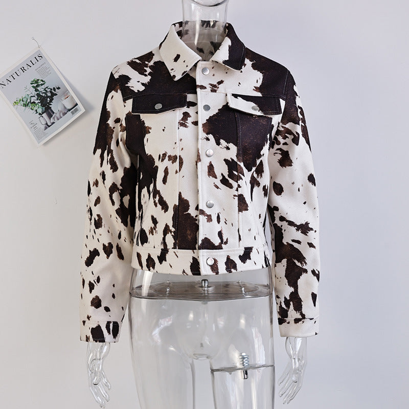 Casual women's denim jacket with cow print and structured accents Chic and Style