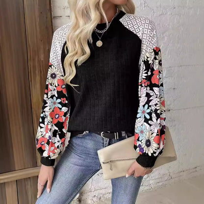 Pull femme à la forme ludique avec un design de manches florales Chic und Stil