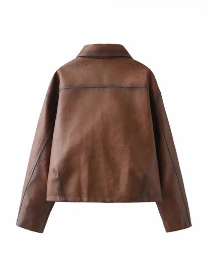 Ladies cropped leather jacket with practical chest pockets and Chic und Stil button details