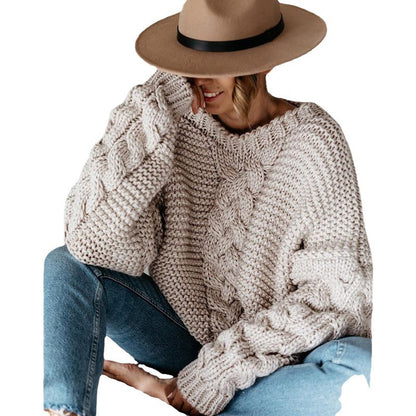 Pull féminin en grosse maille avec motif en torsades et coupe ample Chic und Stil